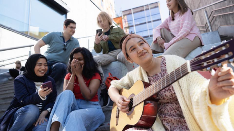 Students sitting on stairs