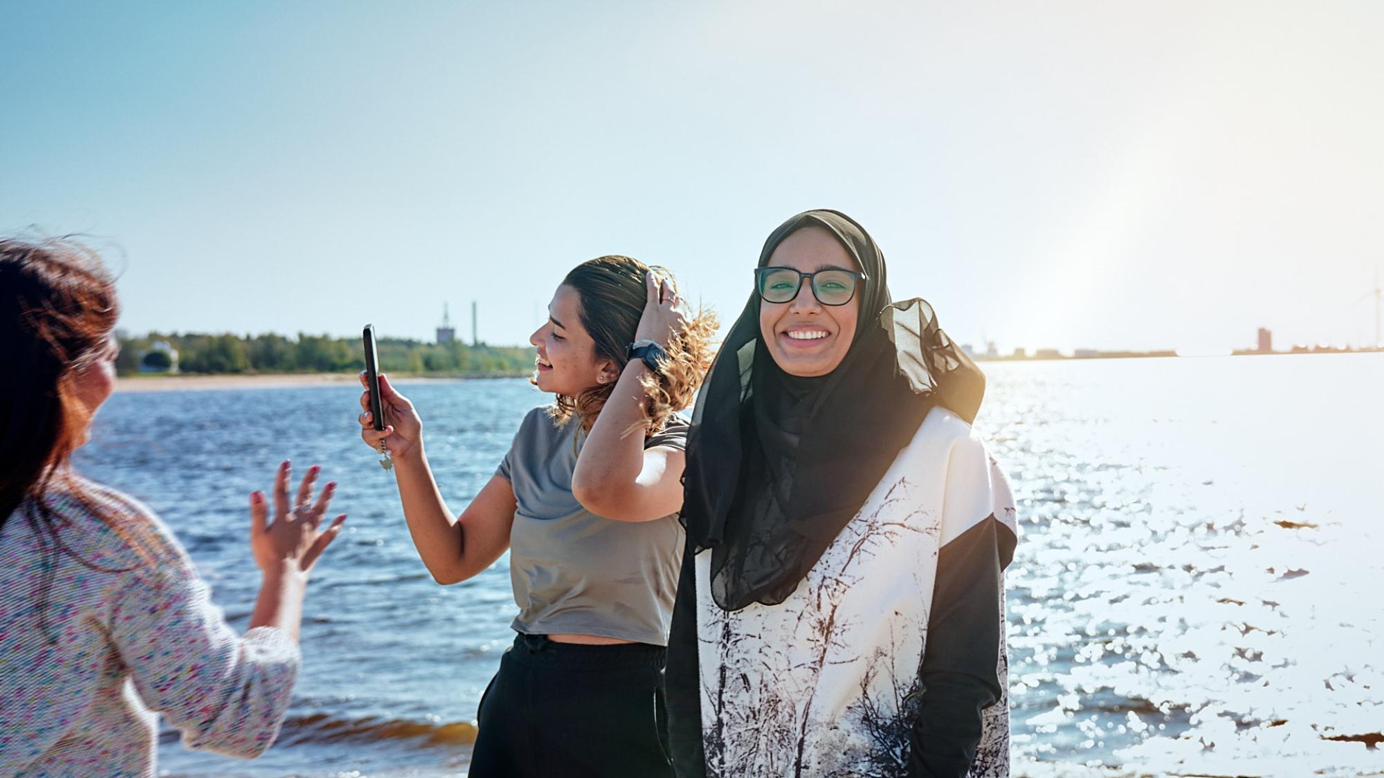 Students in front of sea