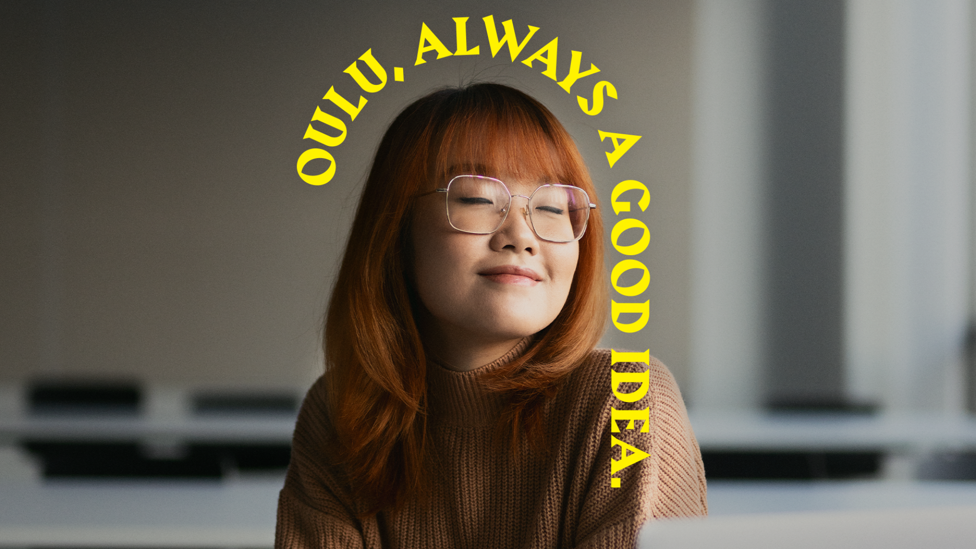 A student is thinking in front of a laptop. Her eyes are closed. An arch appears on top of her head stating Oulu, always a good idea.