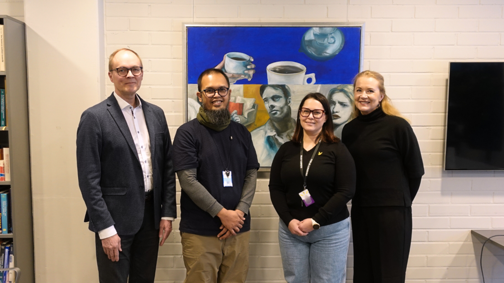 Professor Iman Harymawan pictured with Martti Ahtisaari Institute's Deputy Director Sauli Sohlo, Vice Dean for Education Marika Iivari, and Professor Satu Nätti.