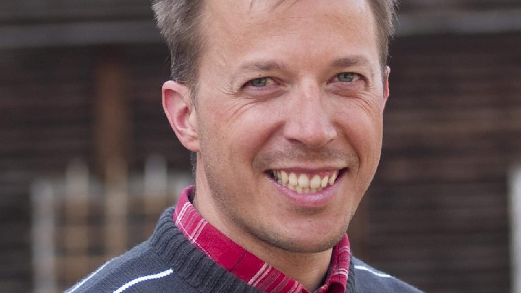 Dr. Juraj Švajda smiling in a portrait