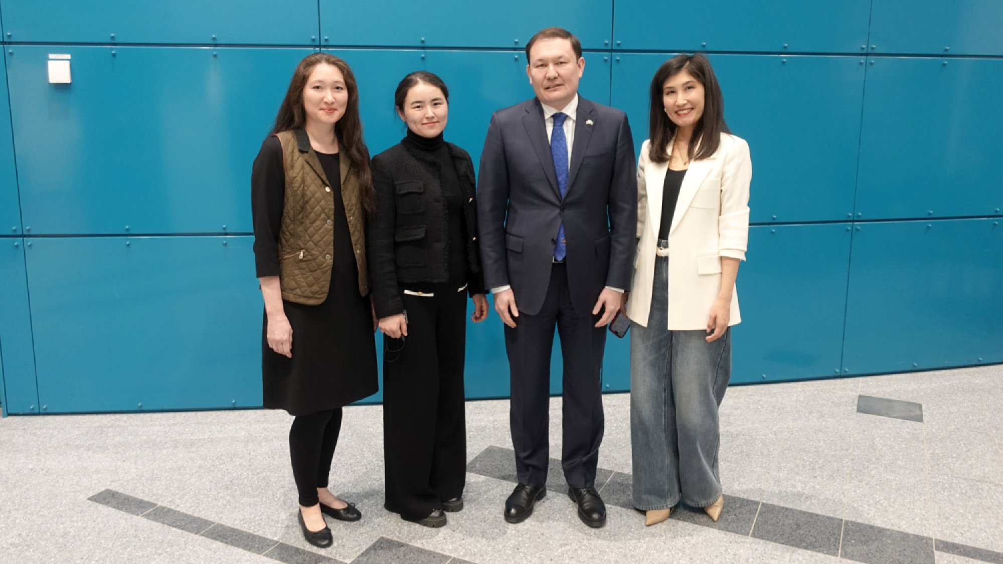 The ambassador pictured with the Kazakh nationals who work at the university: postdoctoral researcher Dr Raushan Aman, doctoral researcher Aigerim Dairabekova, and postdoctoral researcher Dr Aziza Baubekova.
