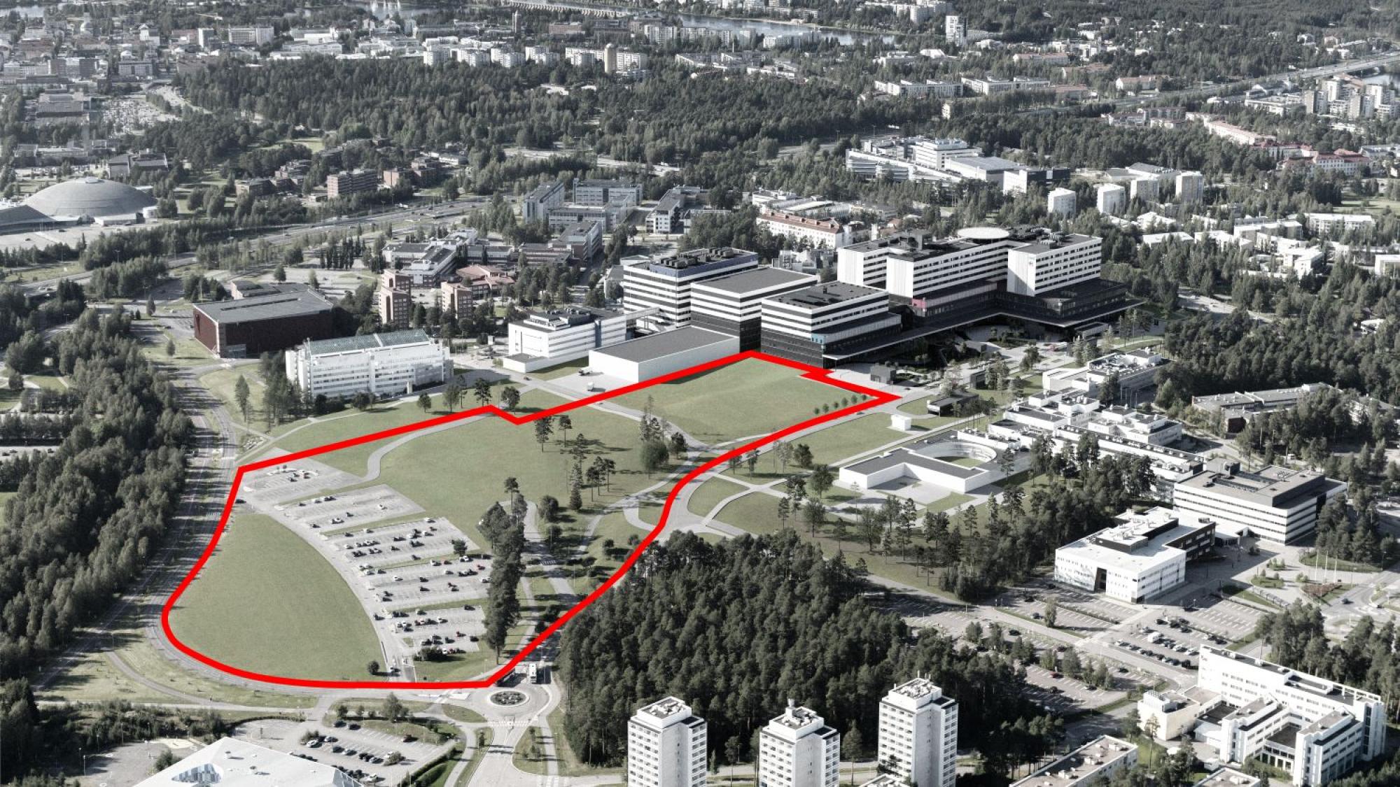 Koillisesta kuvattuun ilmakuvaan kilpailualue on merkitty punaisella viivalla. Kuvassa on esitetty uusi sairaalakokonaisuus, ja kuvasta on poistettu olemassa olevat, purettavat sairaalarakennukset.