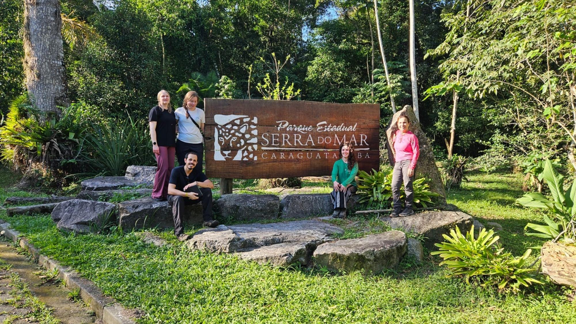 Mar state park in Caraguatatuba with people standing next to sign