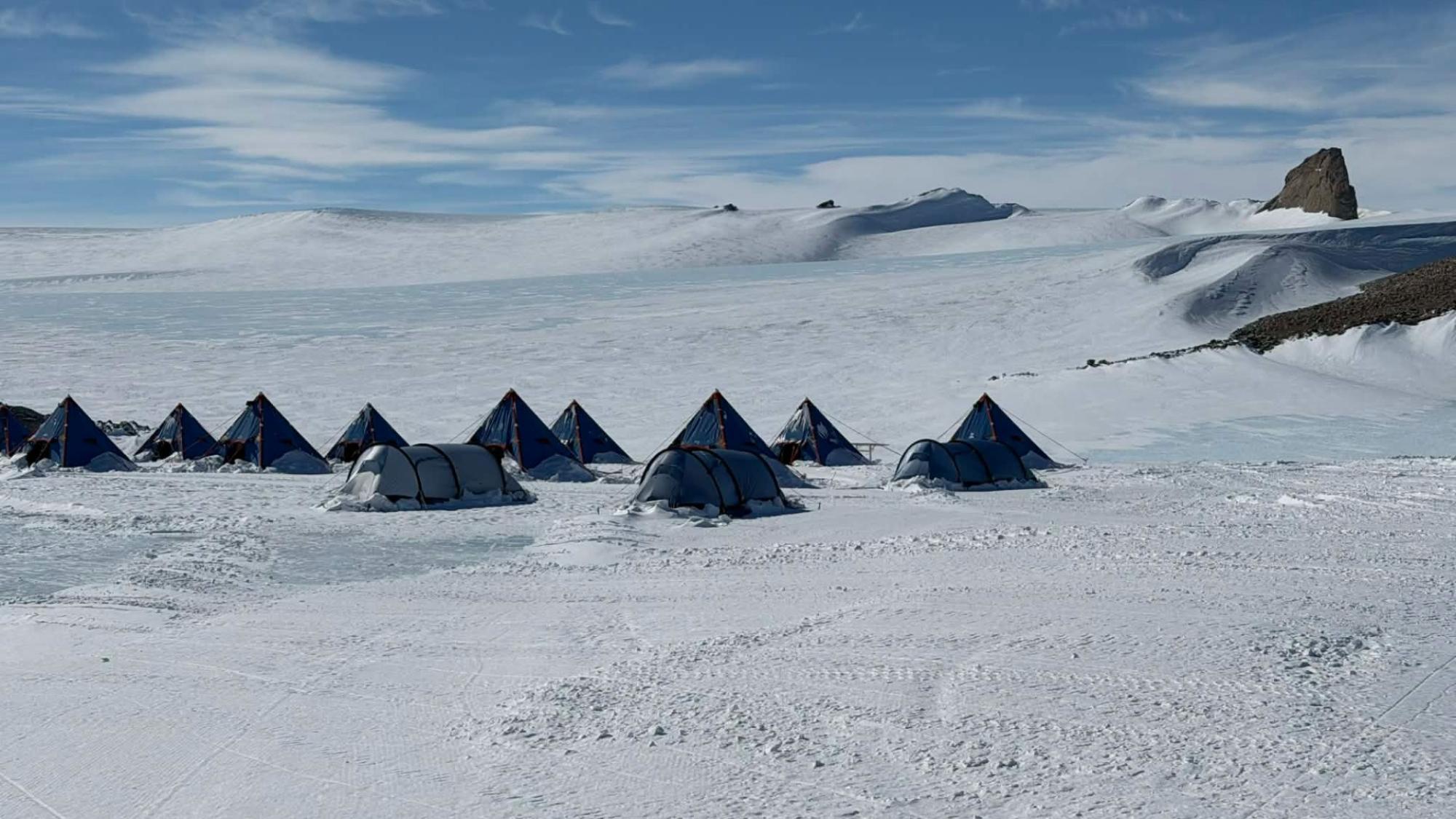 A deep field camp tents for staff members on the Antarctic ice.