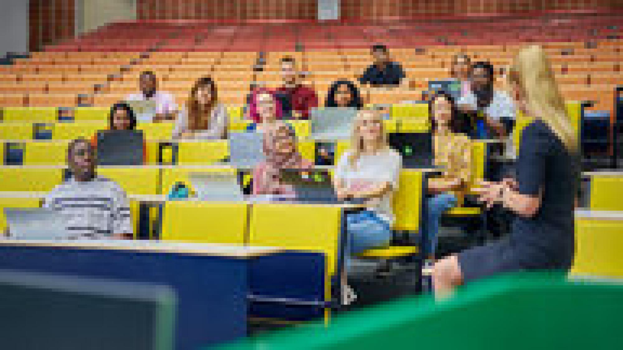 A group of diverse students on a lecture
