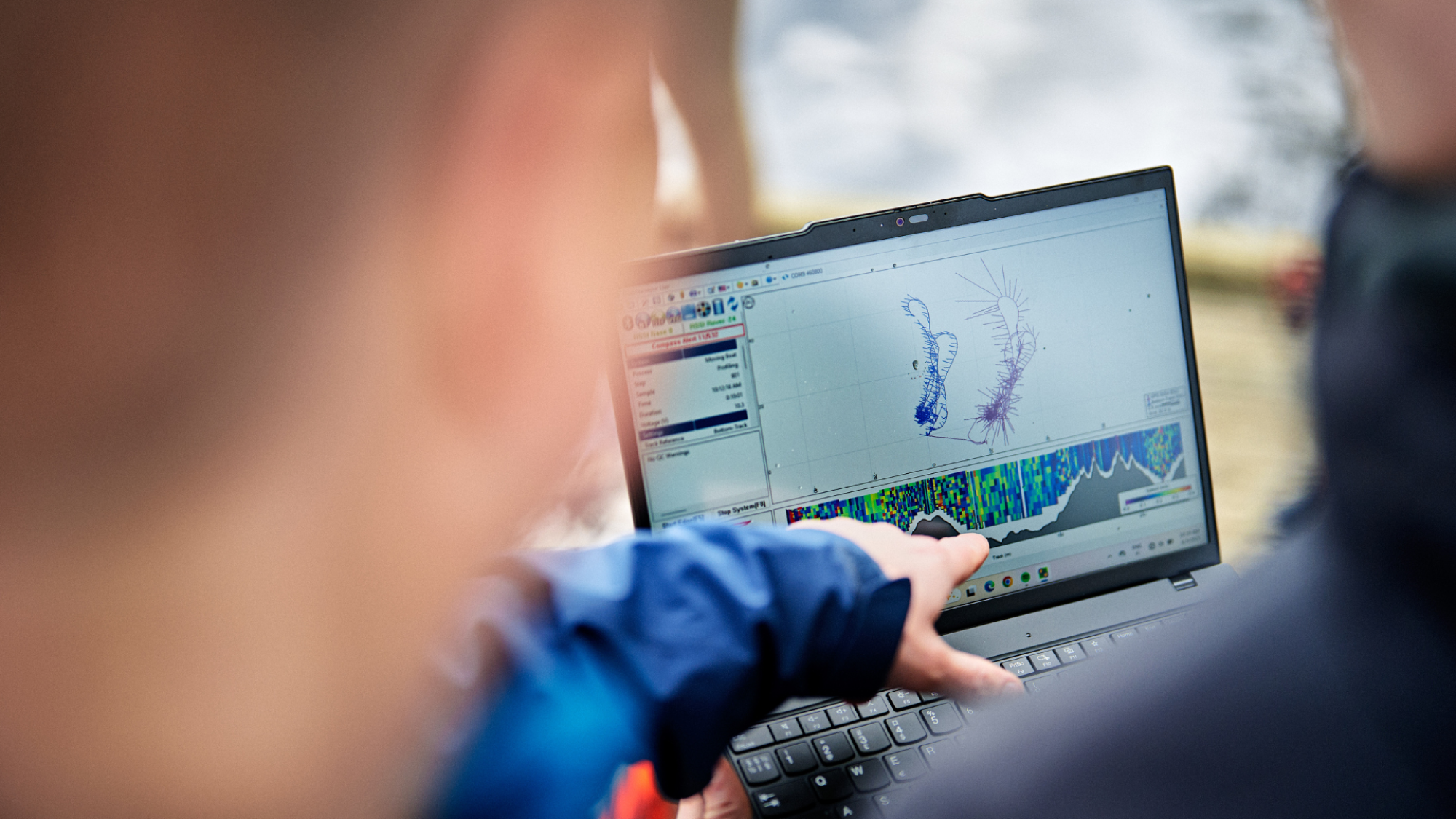 Researcher interpreting data from a computer